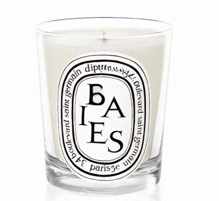 Baies scented candle in a glass jar on white background